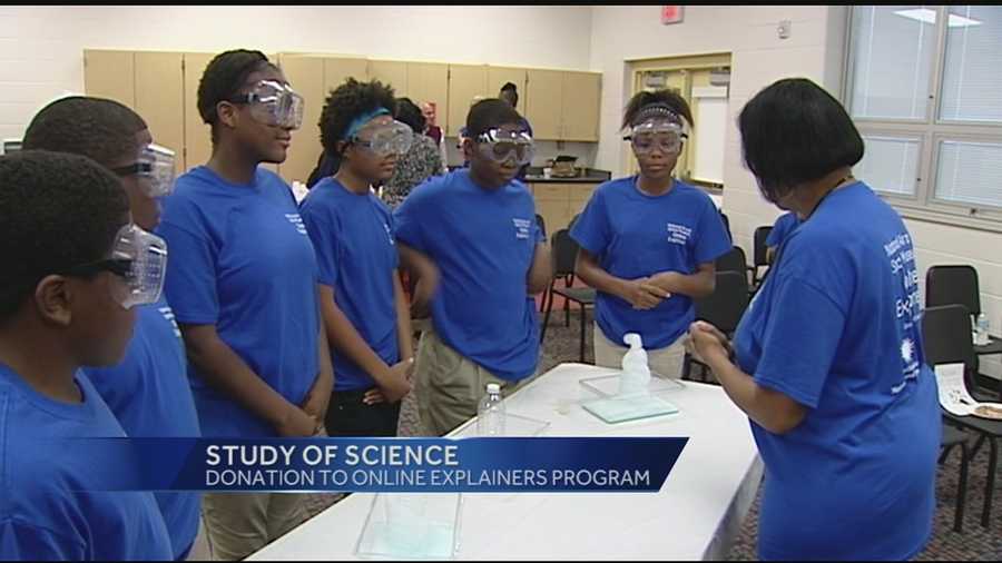 Sixth-grade students from Evanston Academy worked with chemicals Tuesday morning to generate a safe cleaning solution for spacesuits.