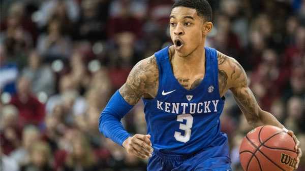 In this Feb. 13, 2016, file photo, Kentucky guard Tyler Ulis (3) pushes the ball down court during the second half of an NCAA college basketball game against South Carolina in Columbia, S.C. Southeastern Conference coaches have picked Kentucky sophomore guard Tyler Ulis as the league's player of the year and defensive player of the year on Tuesday, March 8, 2016.