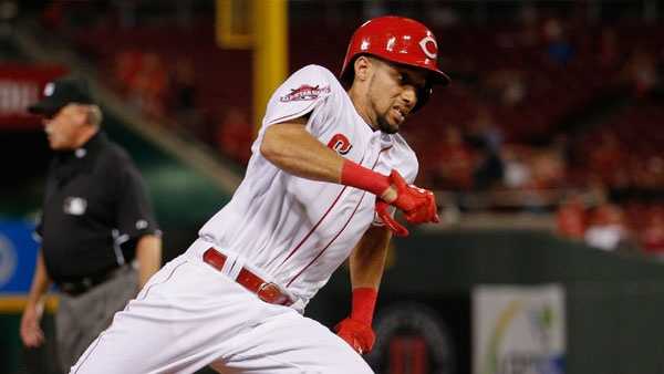 Cincinnati Reds' Billy Hamilton connects for a run scoring single