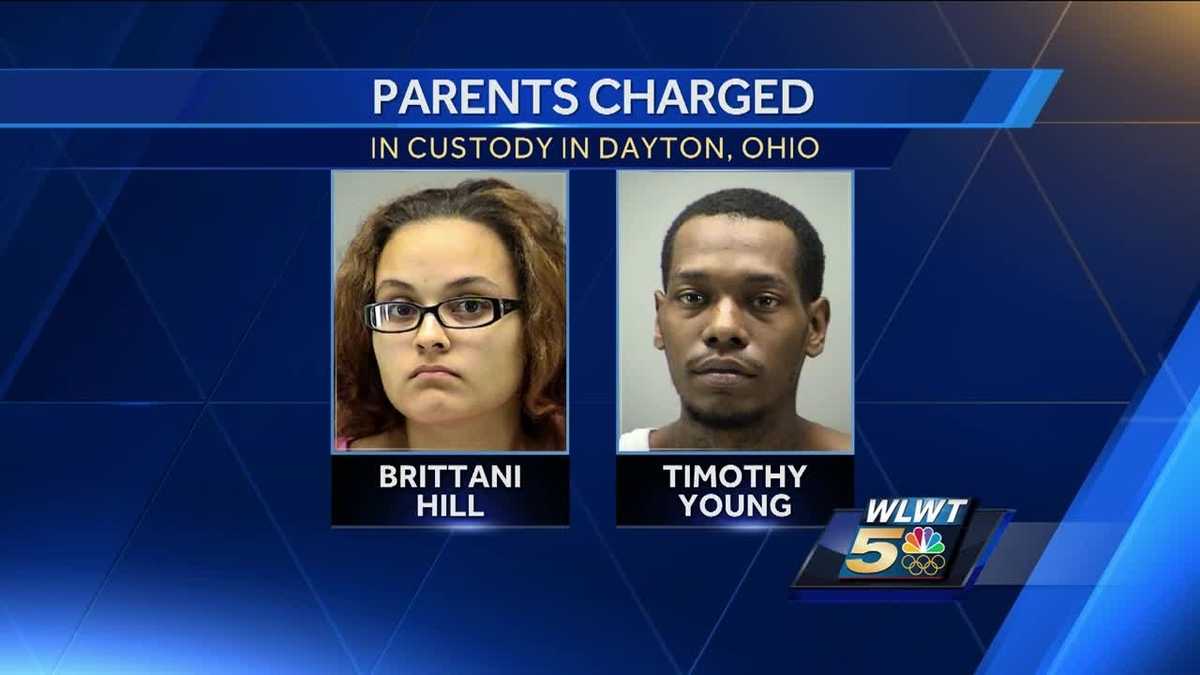 Couple arrested in Dayton after child found buried in shallow grave