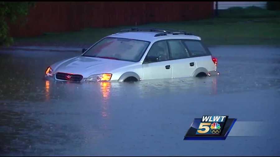 Anderson Township firefighters had a dangerous moment while trying to help people trapped by high water early Thursday.
