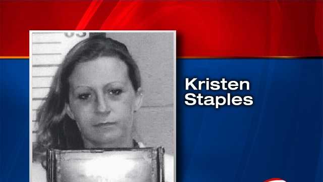 Woman charged with OUI after crash, child in car