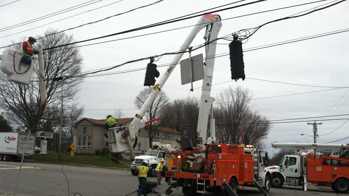 Photos: Truck takes down utility pole wires