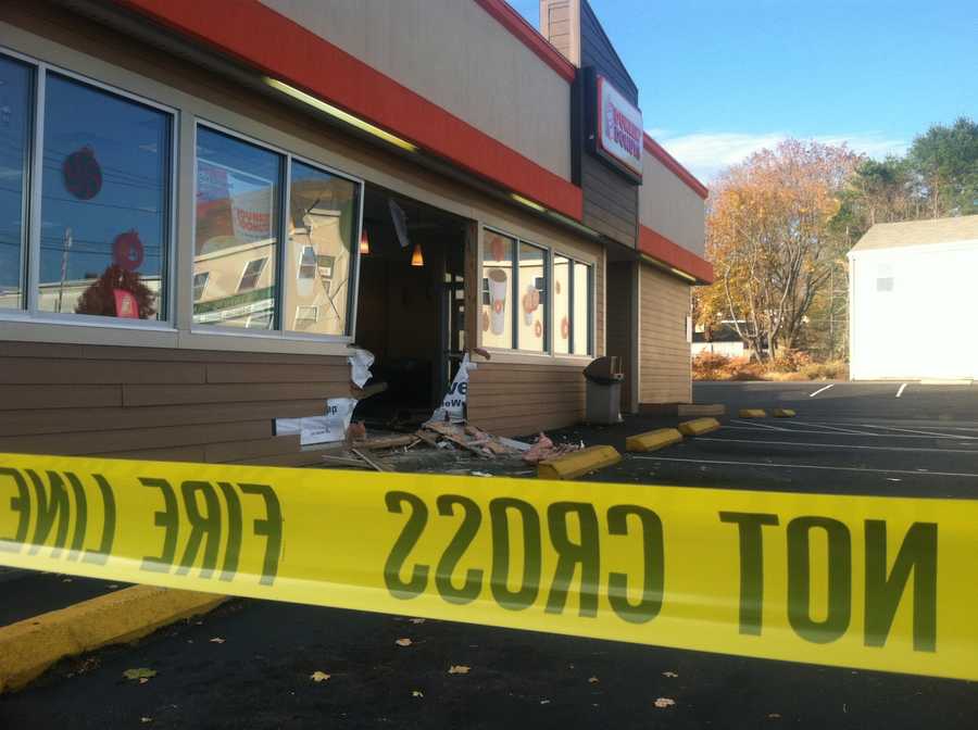 Photos: Car slams into Dunkin' Donuts