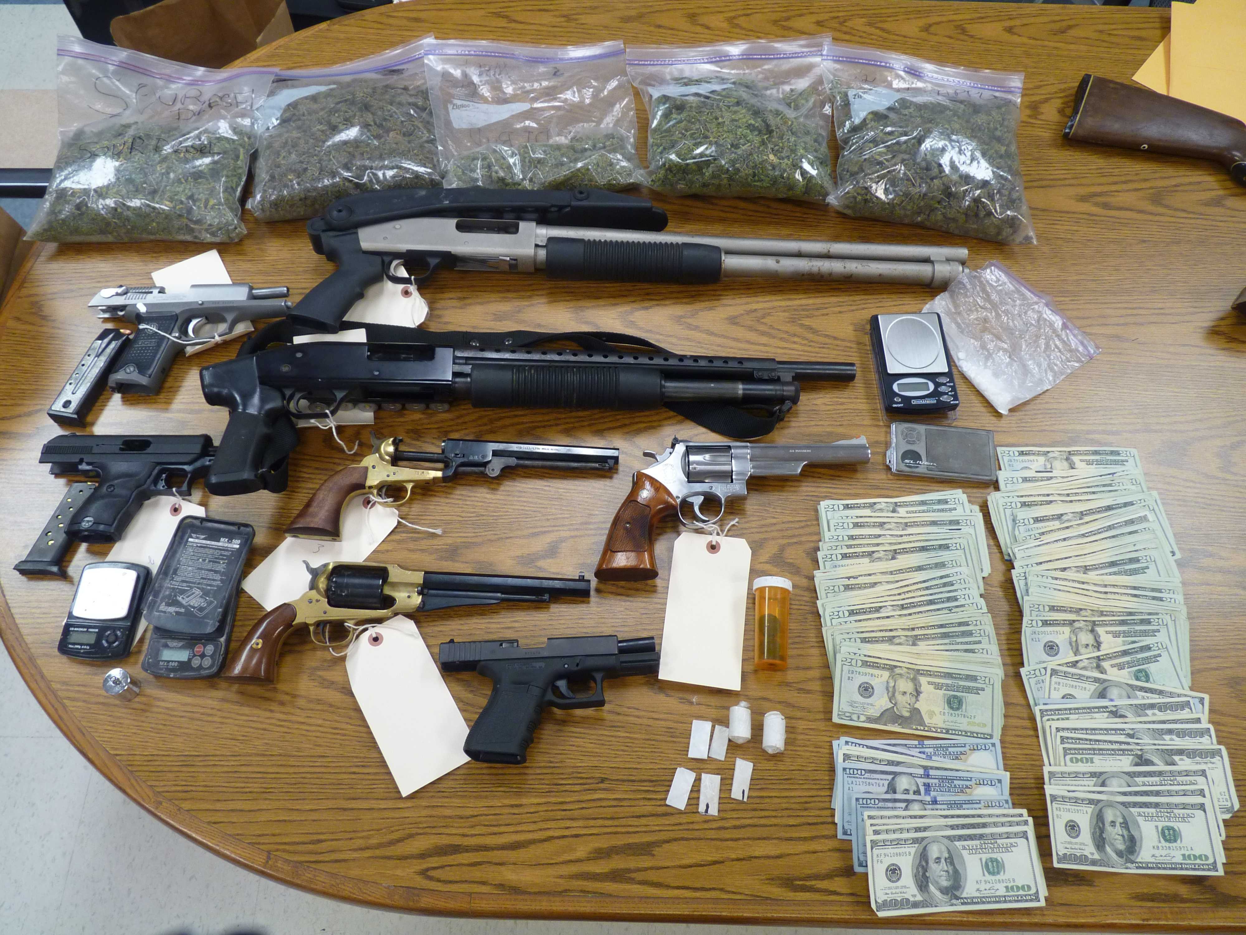 Guns, Drugs, Cash Seized In Buxton Bust