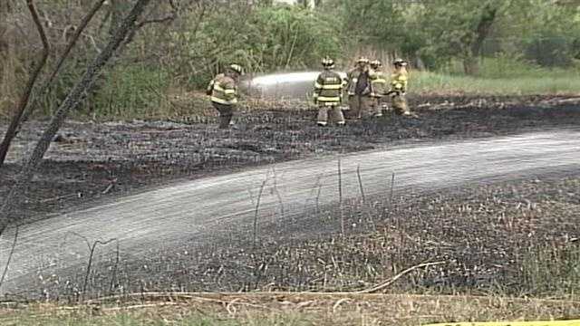 Photos: Brush fire burns 2 acres in South Portland