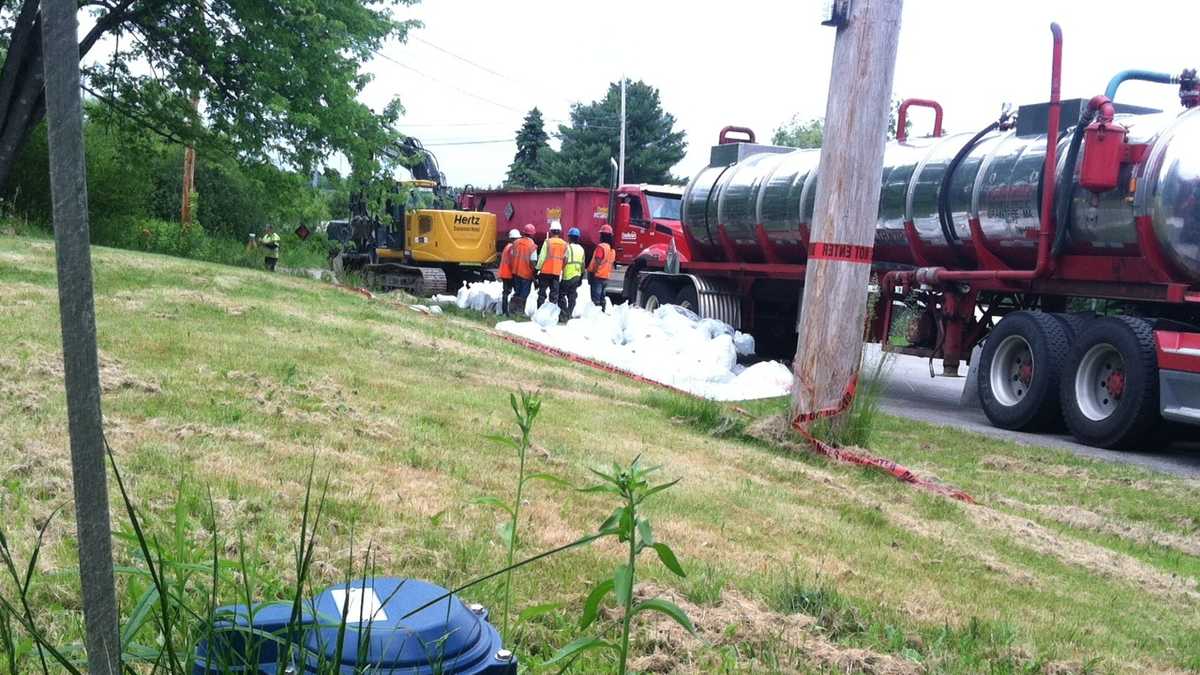 Photos: Crews clean up tanker truck spill