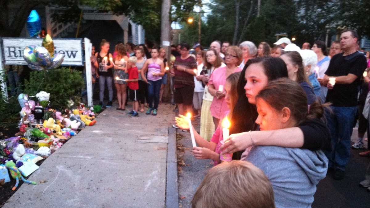 Vigil held for family killed in Saco apartment