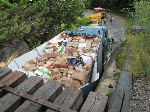 Photos: Tractor-trailer Gets Stuck Under Railroad Bridge