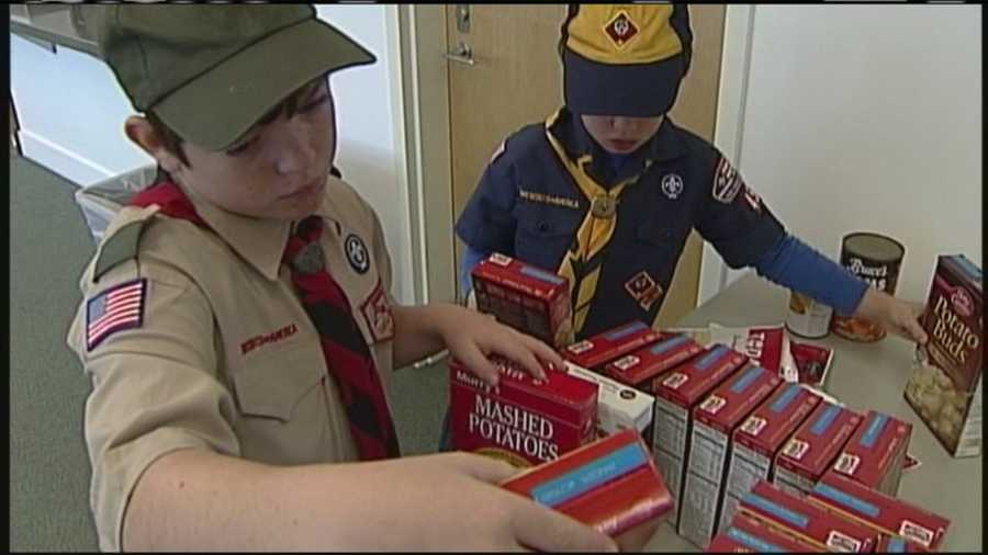 Boy Scouts and Girl Scouts in the Freeport and Pownal communities joined together to deliver food for hundreds of families in need.