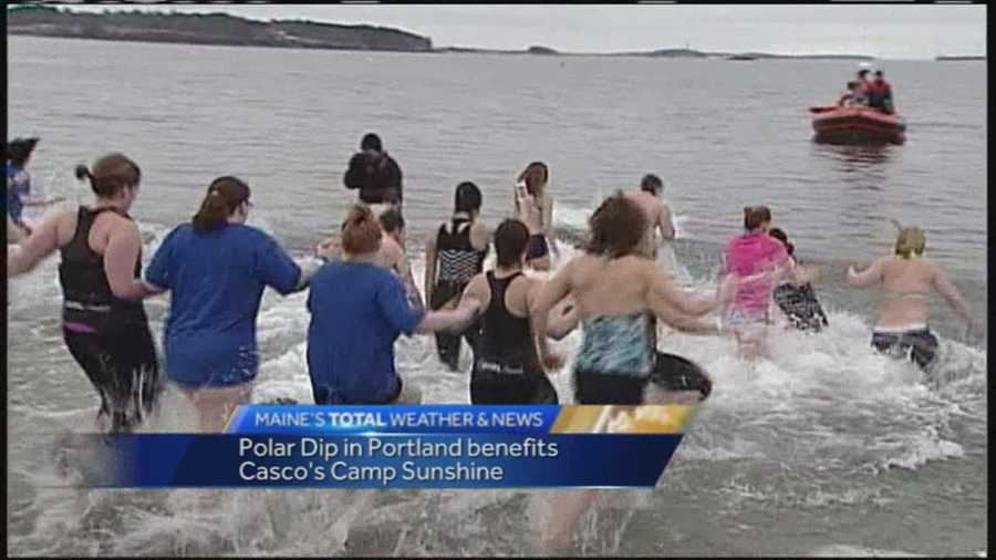Some brave souls plunged into Portland Harbor to raise money for Casco's Camp Sunshine.