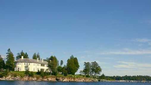 The home is located on 9 acres on a private island that is accessible only by boat. 