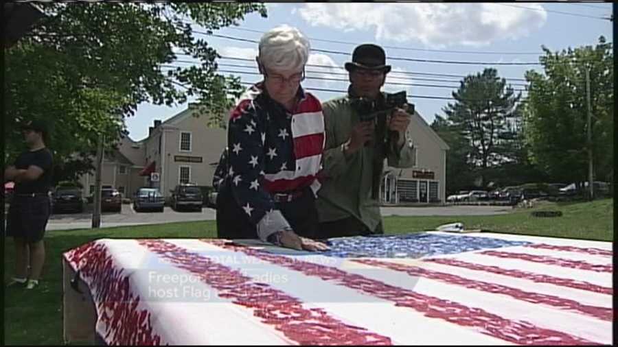 The Freeport Flag Ladies welcomed an artist to Maine on Sunday who is making an American flag out of hand prints.