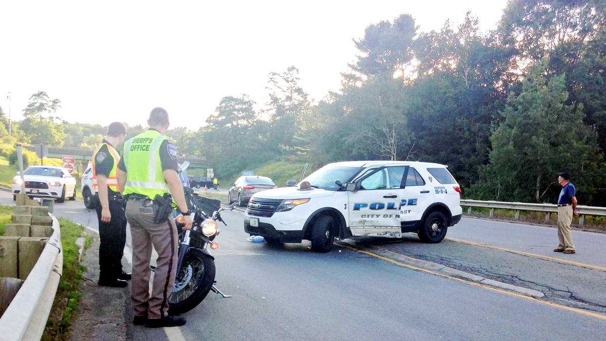 Motorcyclist hurt in crash with police cruiser