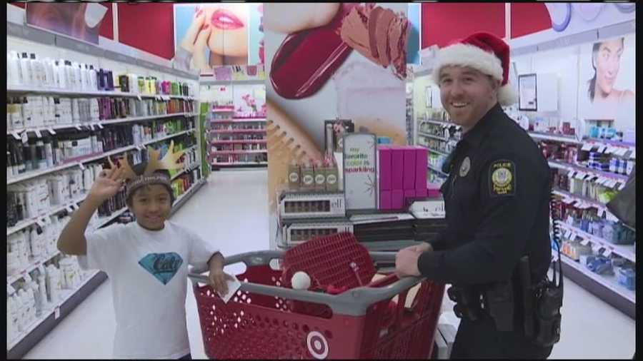 Eight children earned the opportunity to spend the afternoon shopping at Target buying Christmas presents for their families.