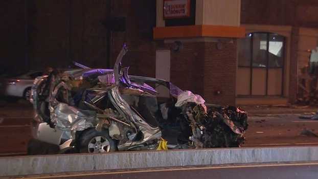 Man, woman killed after car crashes into Dunkin' Donuts