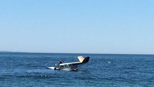 Pilot rescued after plane crashes into water off R.I. coast