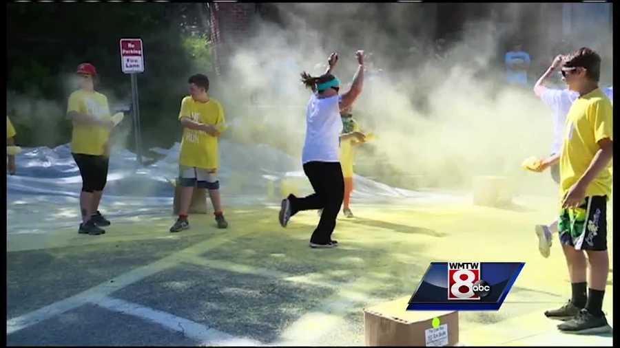 Runners and colored corn starch combined for what is known as "the happiest 5K on the planet" on Sunday.