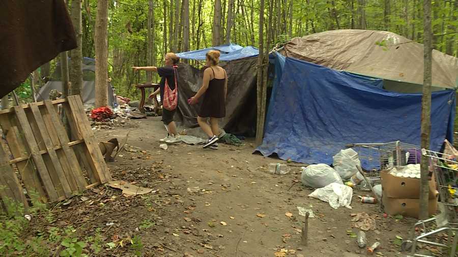 Homeless people living in tents behind a Portland shopping area have been ordered to vacate.