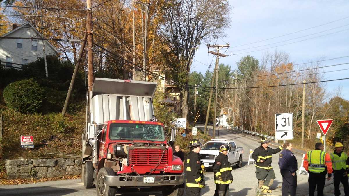 Images Train, truck collide in Wilton