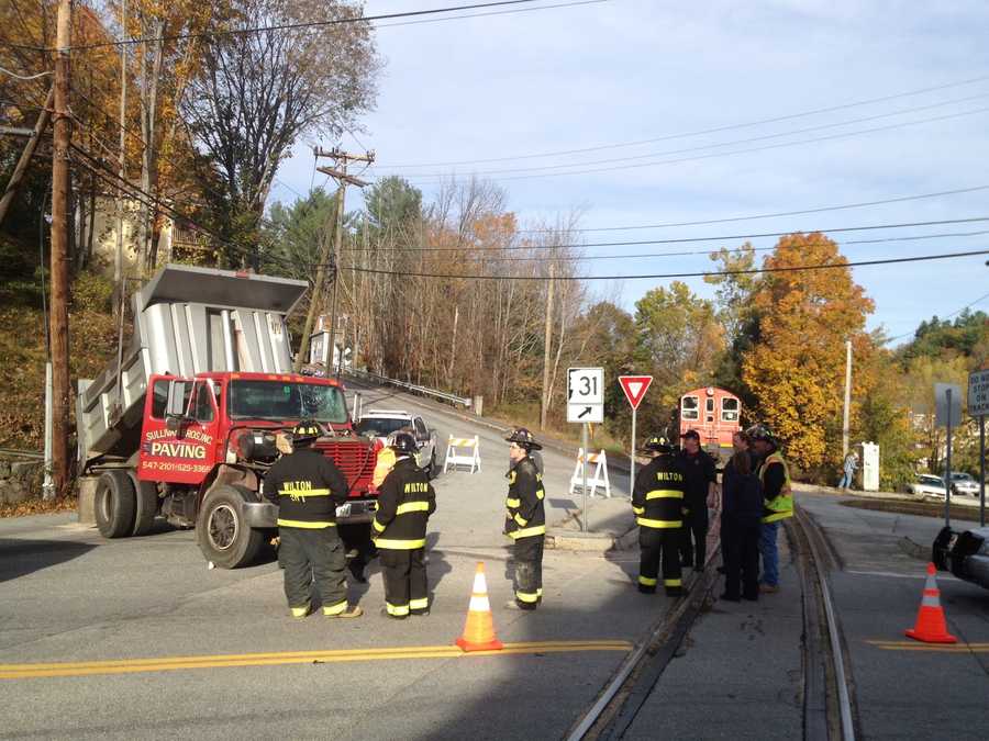 Images Train, truck collide in Wilton
