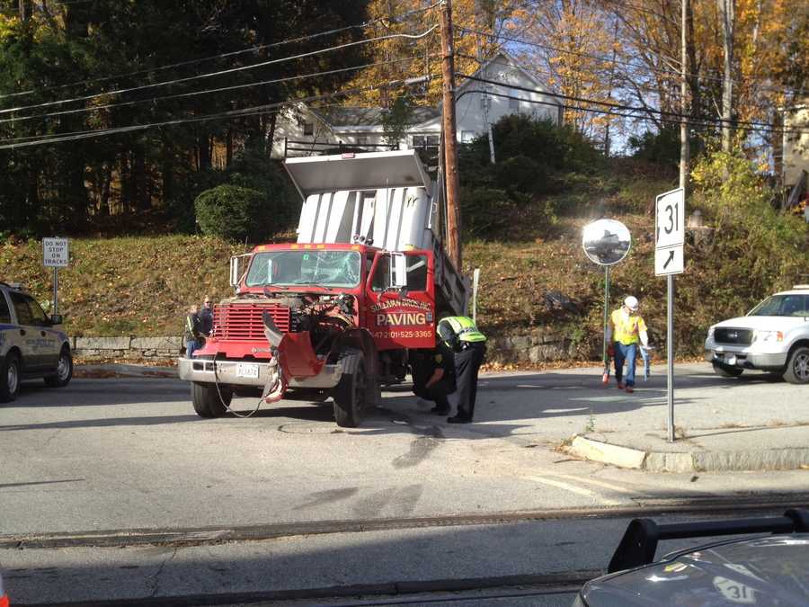 Images Train, truck collide in Wilton