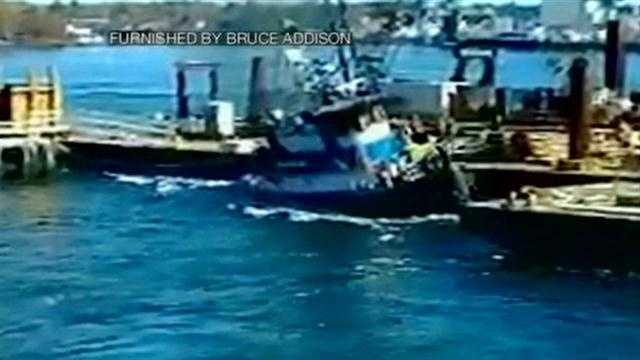A tugboat sinks in Portsmouth.