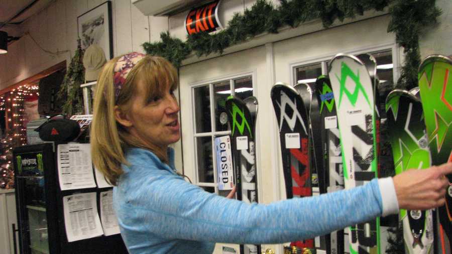 Deb Englehardt, owner of Ski Fanatics in Campton, shows some of the demo skis available daily for rent from her shop, with the cost applicable towards purchase. Demo days are going on across New England to help skiers and riders find the perfect gear.