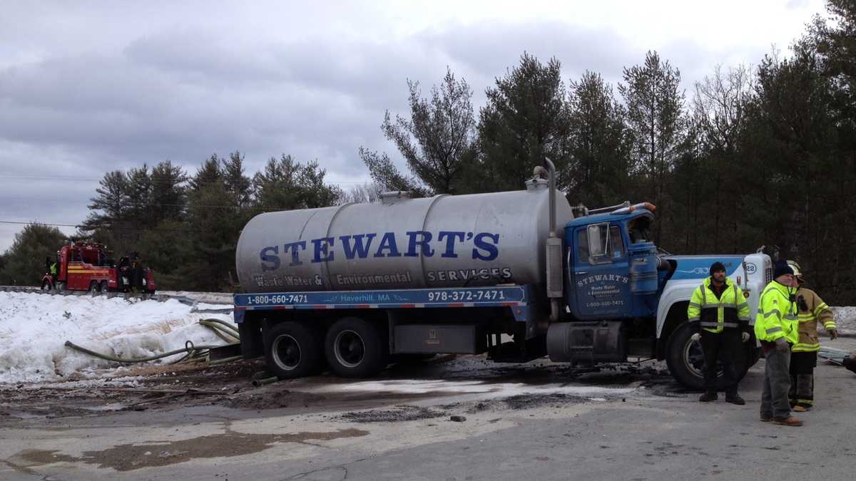 Tanker truck rolls over in Warner