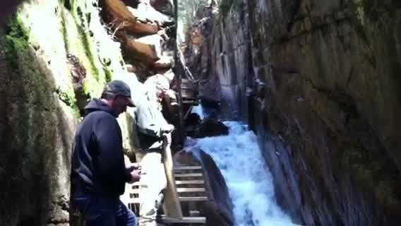 About 500 feet of boardwalk inside the Flume Gorge was returned to its summer spot along the granite walls on Tuesday.