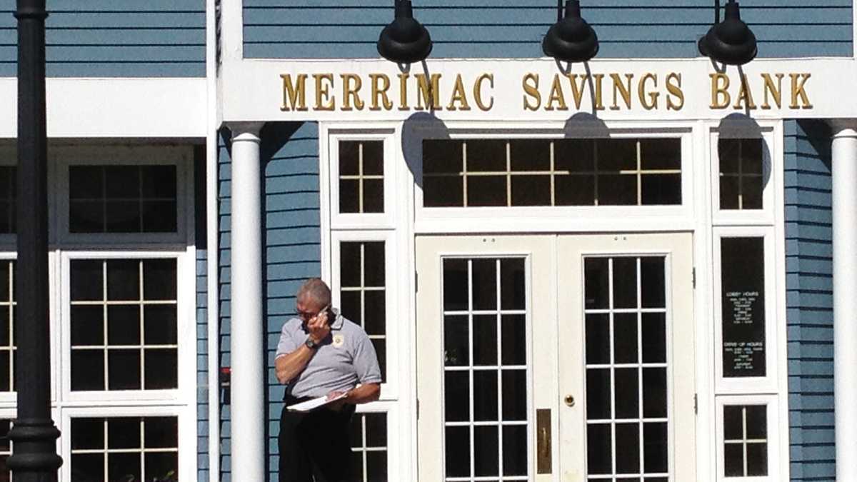 Images Newton bank robber flees on bicycle