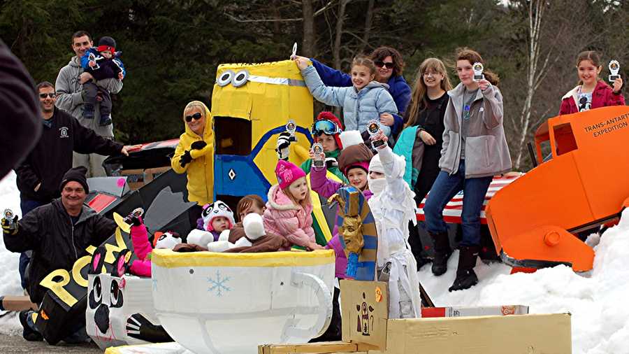 A committee aiming to raise money for an amphitheater reached its goal Sunday during a cardboard sled race fundraiser.