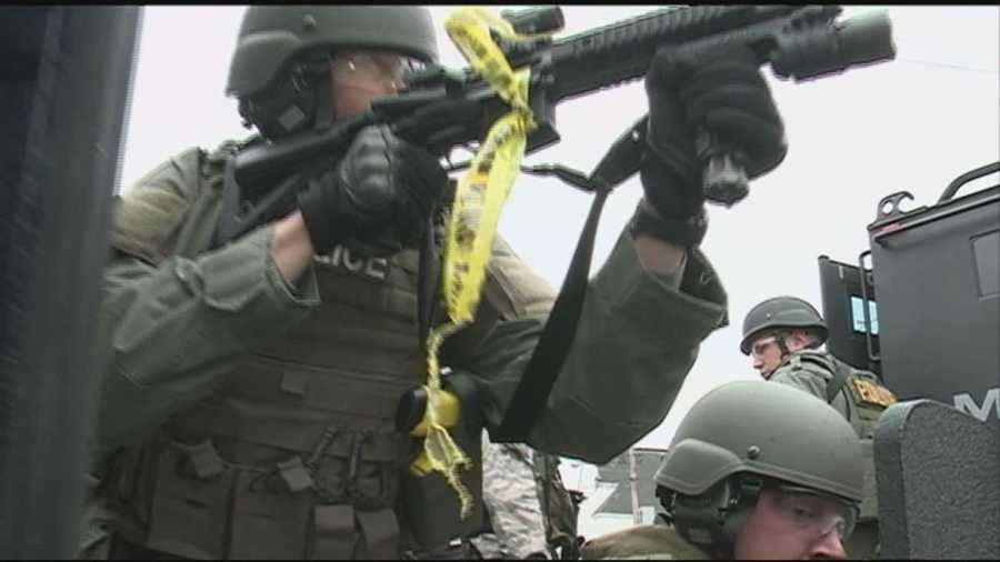 SWAT teams are police officers who put themselves in the direct line of fire, entering buildings where armed suspects may be hiding.