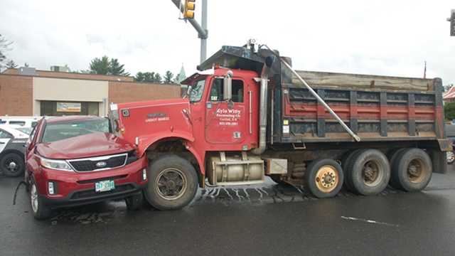 Woman killed in collision with dump truck in Merrimack
