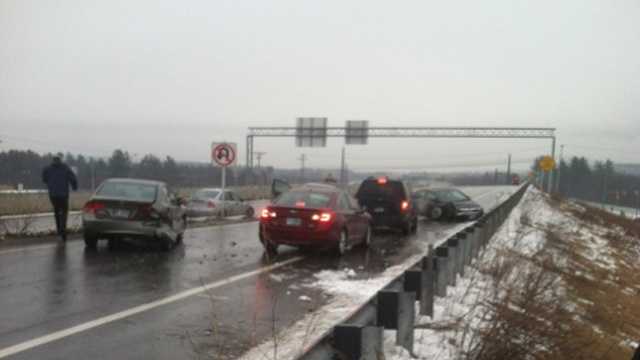 Images: Icy roads lead to dozens of accidents