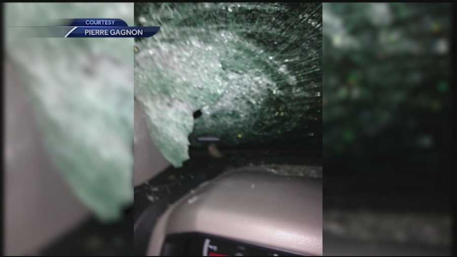 A chunk of ice crashed through the windshield of a Bow man driving to work Monday morning after a snow plow pushed the ice off an overpass.