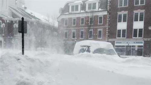 Snow piles high in southern NH as wind gusts intensify