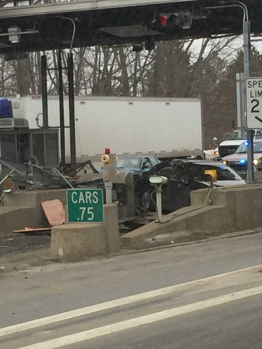 Images Tractortrailer slams through Dover toll booth
