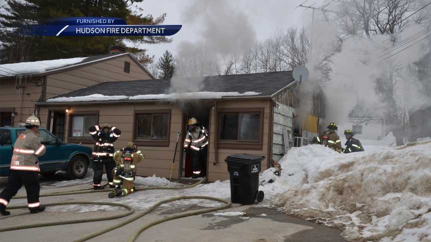 Overheated lamp cord sparks house fire