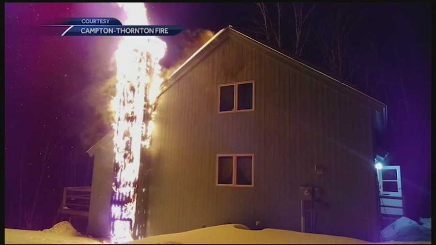 A police office in Campton rescued an elderly woman from a house fire Friday night.