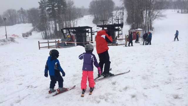 Skiers and boarding are enjoying the final weekend of the ski season at McIntyre Ski Area in Manchester, New Hampshire.