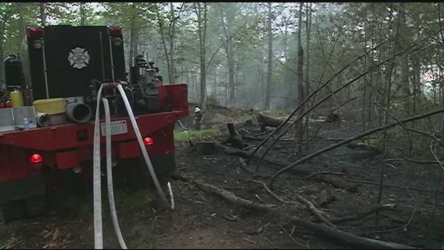 Firefighters tackle another brush fire in Hooksett that  has been burning since noon.