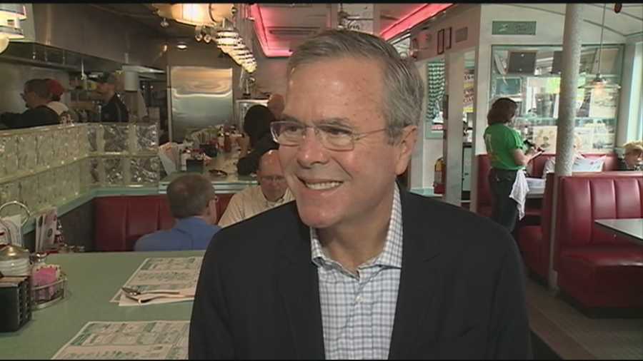 A day after making his candidacy official, former Florida Gov. Jeb Bush headed to New Hampshire, where he held a town hall meeting and made a surprise stop at a diner.