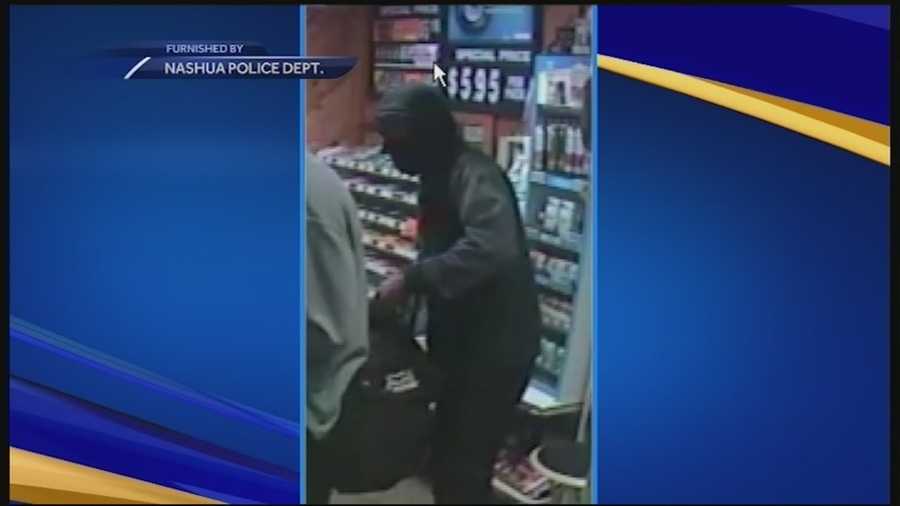 A masked man ordered people to the ground at gunpoint at a Nashua gas station early Wednesday morning, police said.