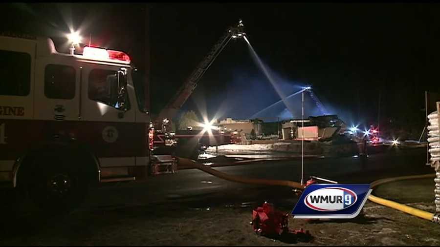 Firefighters battled a two-alarm blaze at a Dunkin' Donuts in Tilton early Wednesday morning.