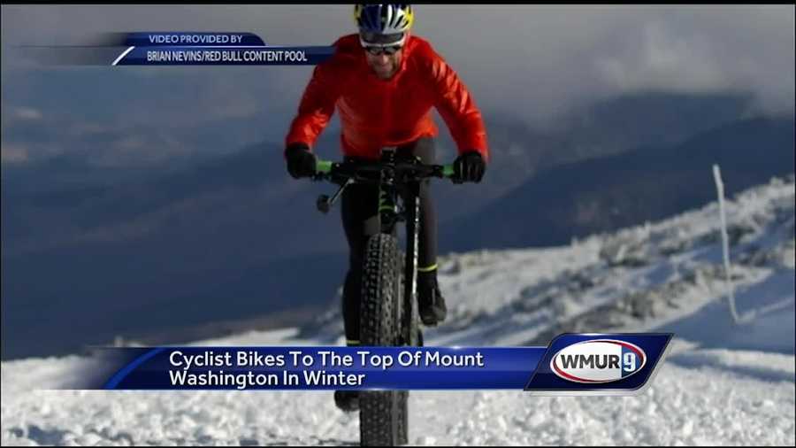 Cyclist bikes to top of Mount Washington in winter
