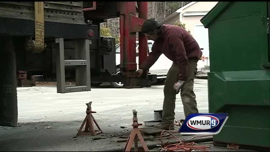 New Hampshire officials say the state's unemployment rate dipped below 3 percent in January, the lowest it's been since 2001.