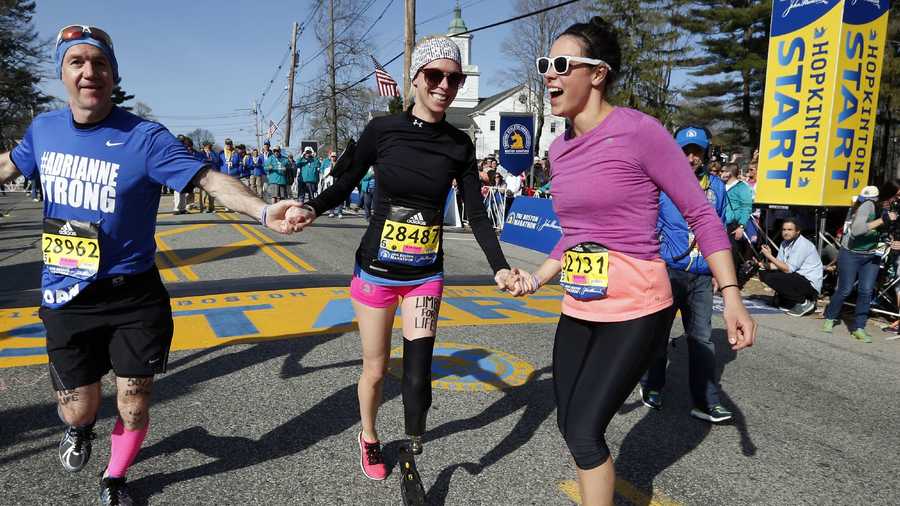 Boston Marathon bombing survivor Adrianne Haslet, center, starts the 120th Boston Marathon.