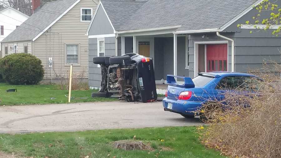 Car topples over after crash in Dover
