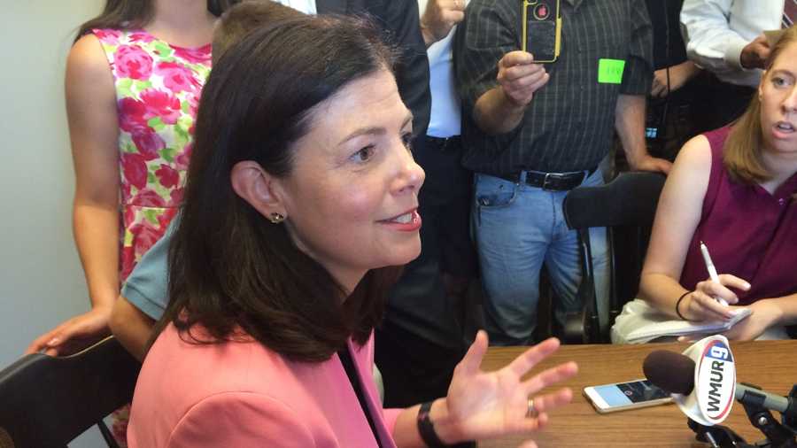 Sen. Kelly Ayotte speaks with reporters after filing her candidacy for re-election Wednesday at the State House. 